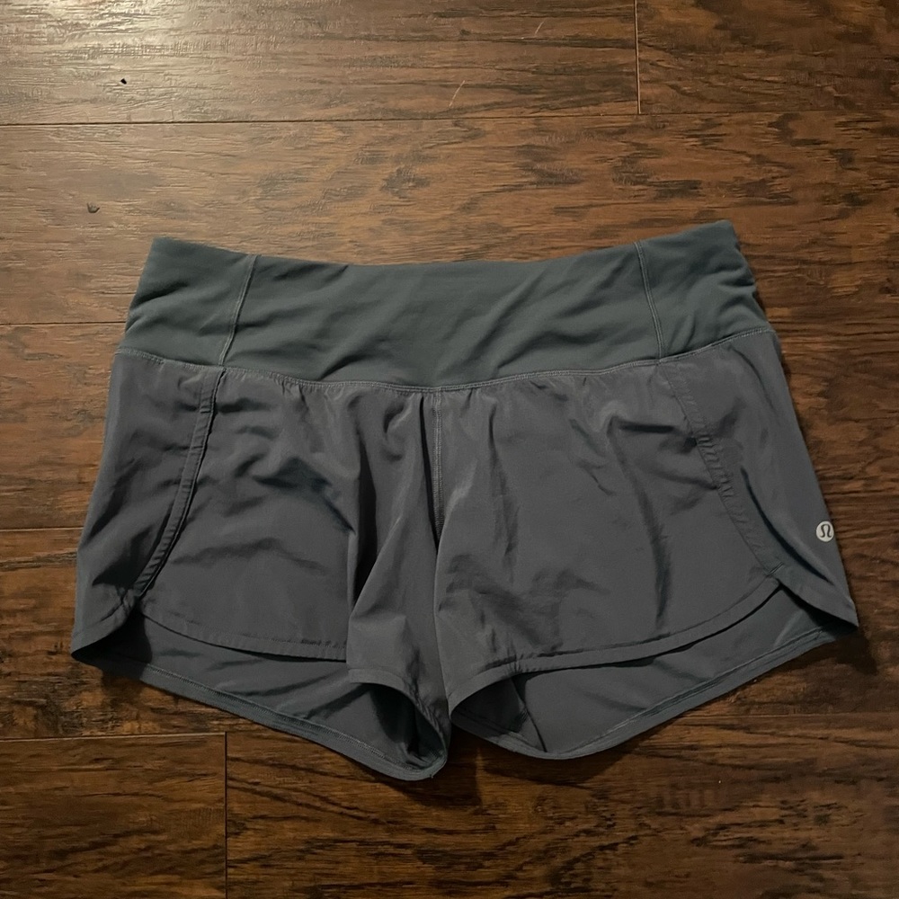 Green athletic shorts